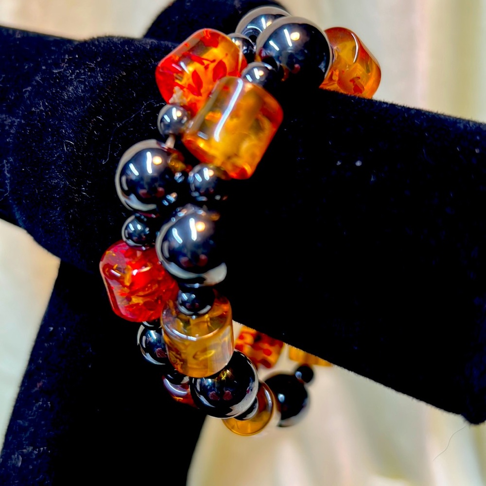 Magnetic hematite and amber stretch bracelets. Pre-owned.